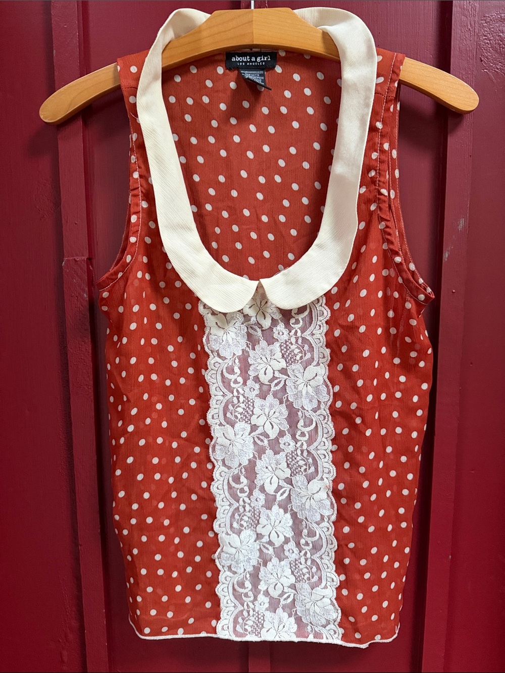 About A Girl Rust Red Polka Dot Lace-Front Sleeveless Top with Cream Collar